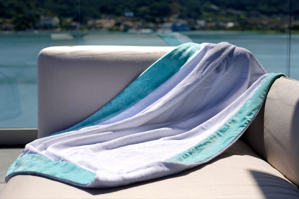 Telo in cotone con bordo in velour